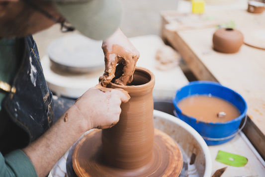 Take intro to throwing at the wheel in tao of clay ceramics studio in San Diego