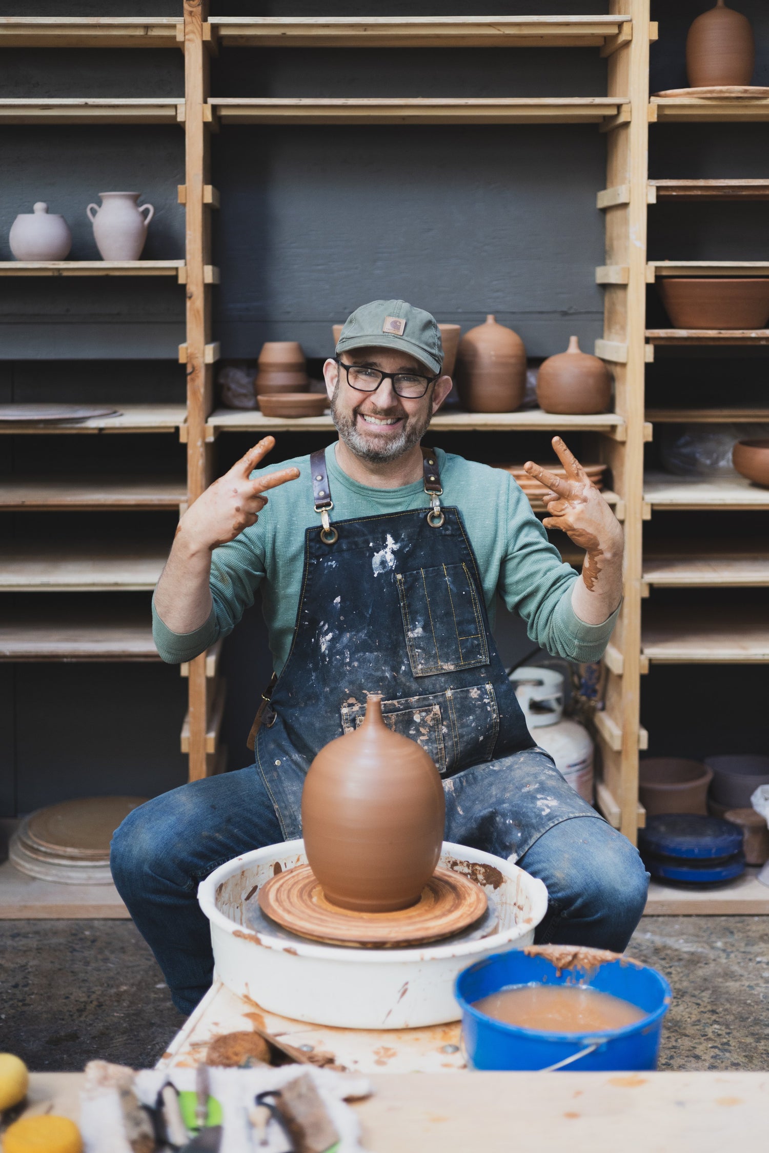 Josh Herman posing after teaching a ceramics class at San Diego Pottery Studio.