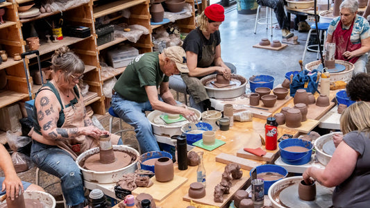 Students learning ceramic techniques during a one-day pottery workshop at Tao of Clay in San Diego.